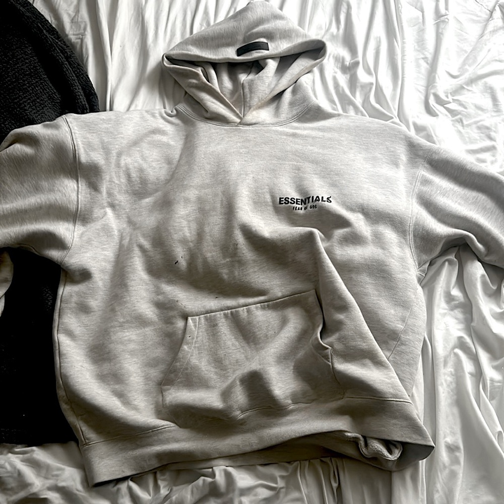 This is an xl essentials hoodie, barely worn, tags and letters still intact.